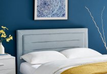 Ortase bedstead in pale blue fabric